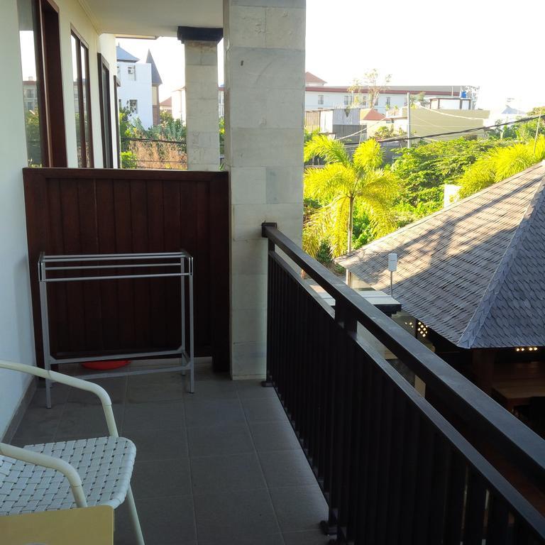 Suji Apartment Bali Pokoj fotografie