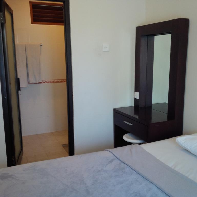 Suji Apartment Bali Pokoj fotografie