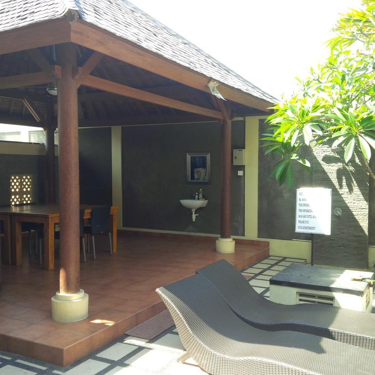 Suji Apartment Bali Pokoj fotografie
