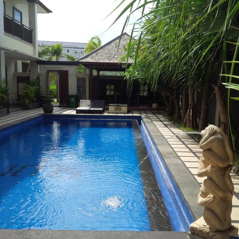 Suji Apartment Bali Pokoj fotografie