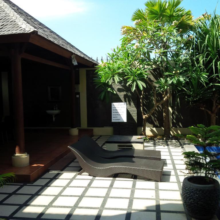 Suji Apartment Bali Pokoj fotografie