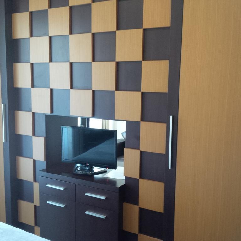 Suji Apartment Bali Pokoj fotografie